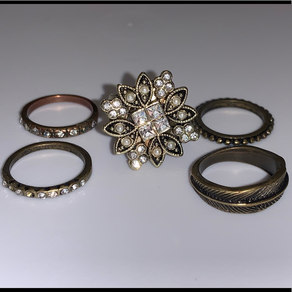 Adjustable big ring, four smaller ones are size 8